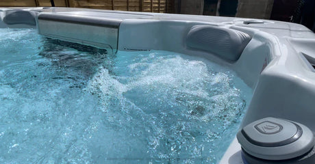 hot tub with water being changed, highlighting steps of the process